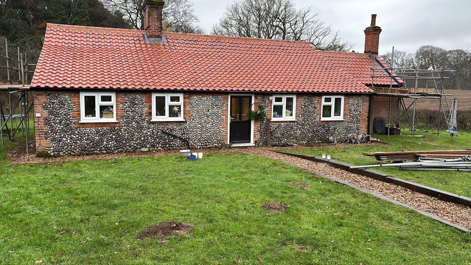Finished re-roof on a Norfolk flint cottage by S Mallett Roofing